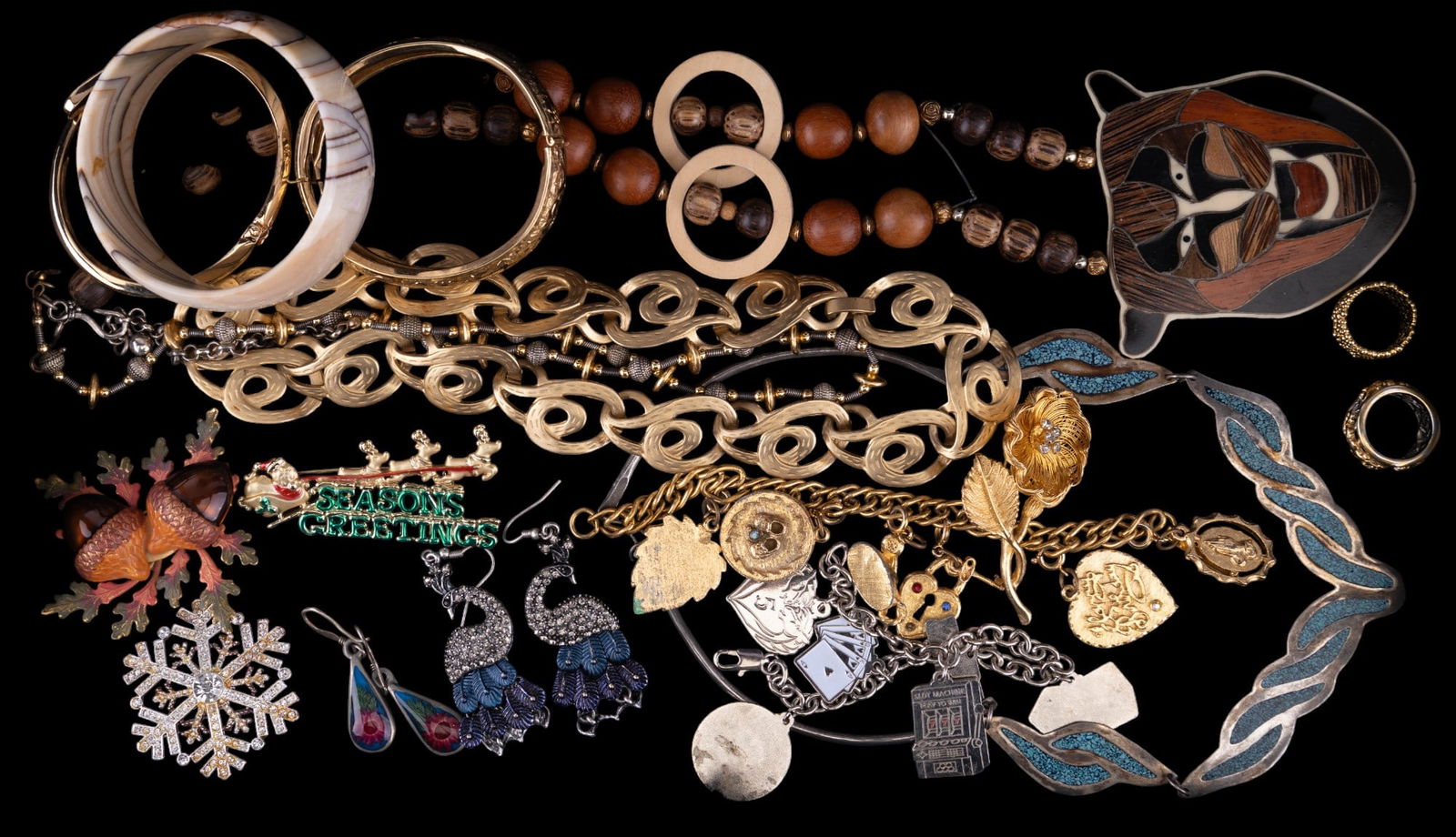 Vintage Estate Jewelry Collection: Highlights include large inlaid multi-wood monkey necklace, fine turquoise inlaid silver alpaca necklace, charm bracelets, peacock and other earrings, brooches and more.