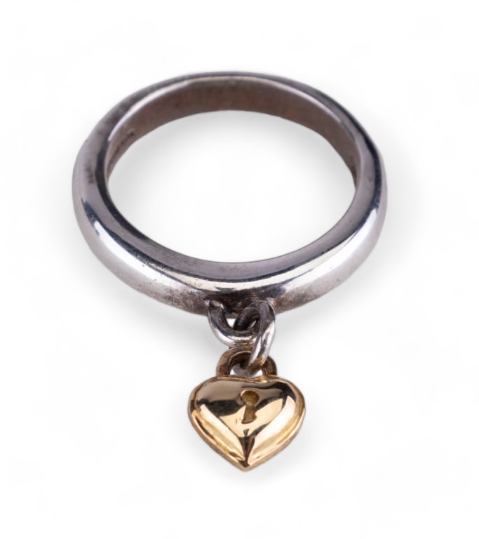 Tiffany and Company 18K Gold Sterling Ring: Tiffany and Company sterling silver designer ring with 18K solid gold heart lock 1994.