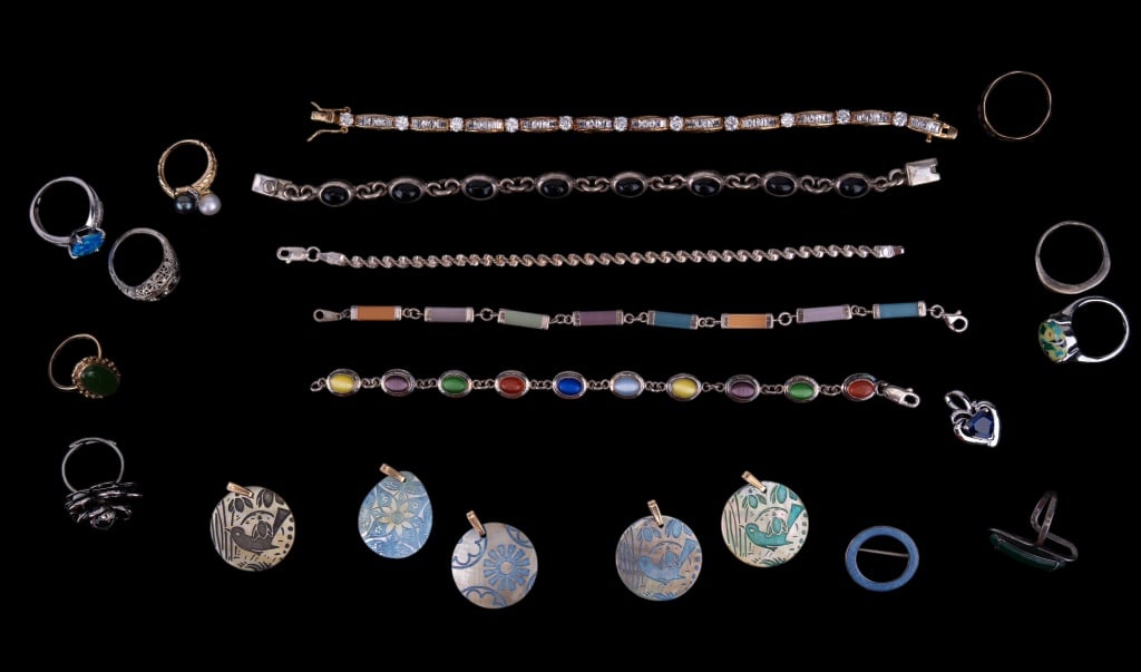 Sterling Silver Bracelets, MOP & More Jewelry: Five sterling silver bracelets including Mexican silver with onyx, mother of pearl pendants, sterling pendant with blue sapphire stone and more. One bracelet has gold over sterling with CZ stones.