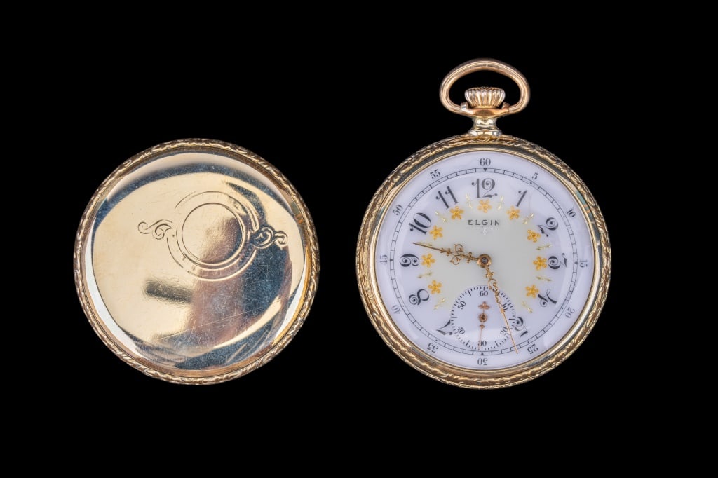 Elgin 1914 Antique Pocket Watch: 1914 antique Elgin pocket watch. Serial number 17640006. Size 16, 15 jewels, grade 313, model 7, pendant set, fancy dial, 25 year Elgin gold filled case, runs.