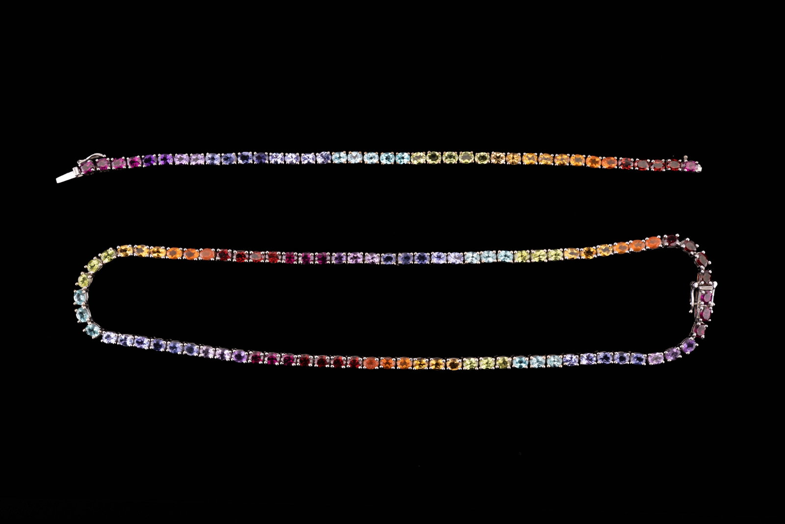 Rainbow Sterling Silver Jewelry: Multi-hue semi precious rainbow sterling silver tennis bracelet (approx 8" L) and necklace (approx 16" L). Stones include citrine, garnet, aquamarine, peridot and more.