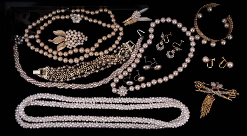 Designer and Other Faux Pearl Jewelry: Designer and Other Faux Pearl Jewelry-including a hummingbird brooch marked Boucher, Marvella faux pearl necklace, a Trifari grape brooch and other jewelry.