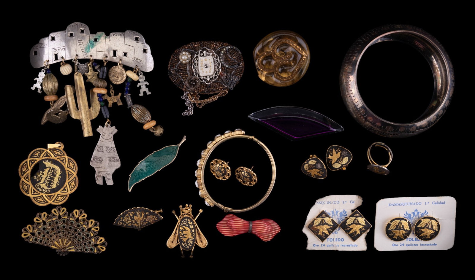 Damascene & Vintage Jewelry: Damascene jewelry including clip and pierced earrings, pendant and more, silver tone African animal scene bracelet, pins and various other jewelry.