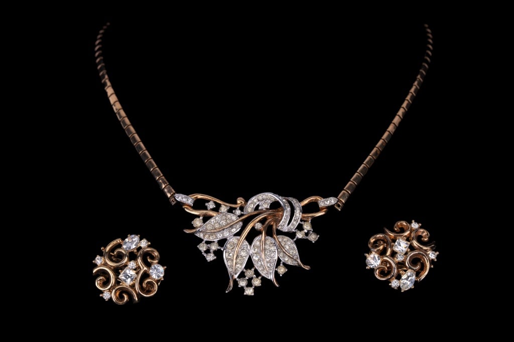 Early Trifari Estate Jewelry: Circa 1940's Trifari patent pending with crown signed ornate crystal rhinestone gold tone necklace with matching earrings.