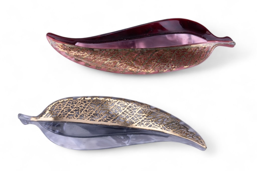 Lea Stein Paris Estate Brooches: Two Lea Stein Paris large celluloid filigree design brooches.