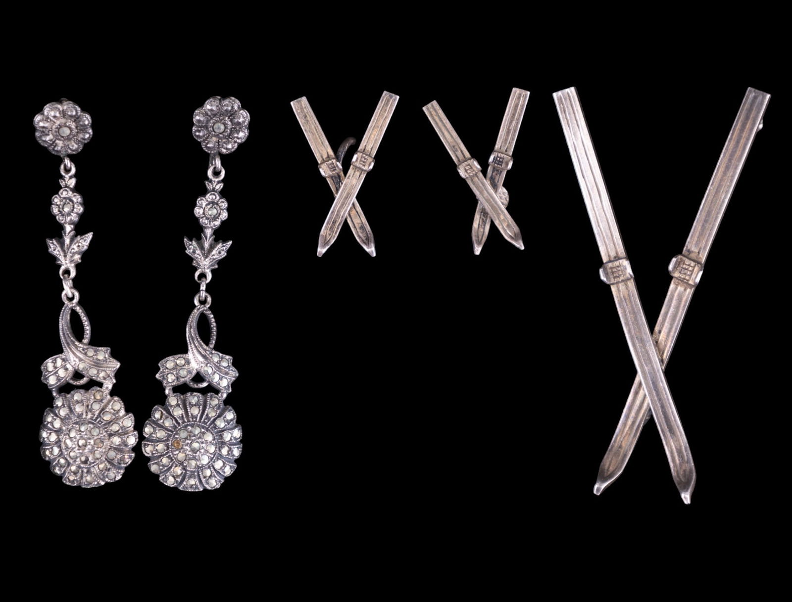 Vintage Estate Sterling Jewelry Collection: Early signed fish within fish logo long ski brooch with matching ski screwback earrings and long Art Deco floral design style screwback earrings (marked sterling with possible igloo bear design).