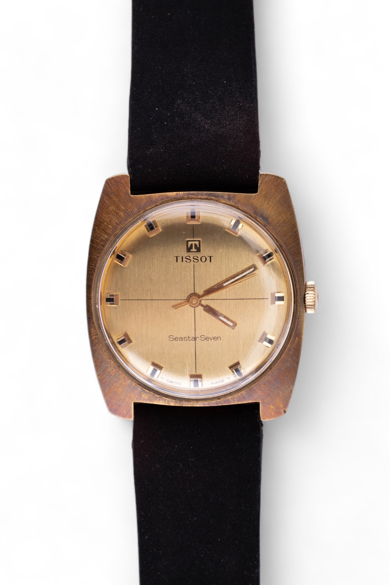 Vintage Tissot Seastar Seven Men's Watch: A vintage gold tone Tissot Seastar Seven men's watch with original Corfam calf lined Tissot band. Watch is marked Plaque G20 LL, in working condition, mechanical-hand-wind, waterproof, and Swiss made.