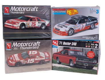 Four NIB Model Cars
