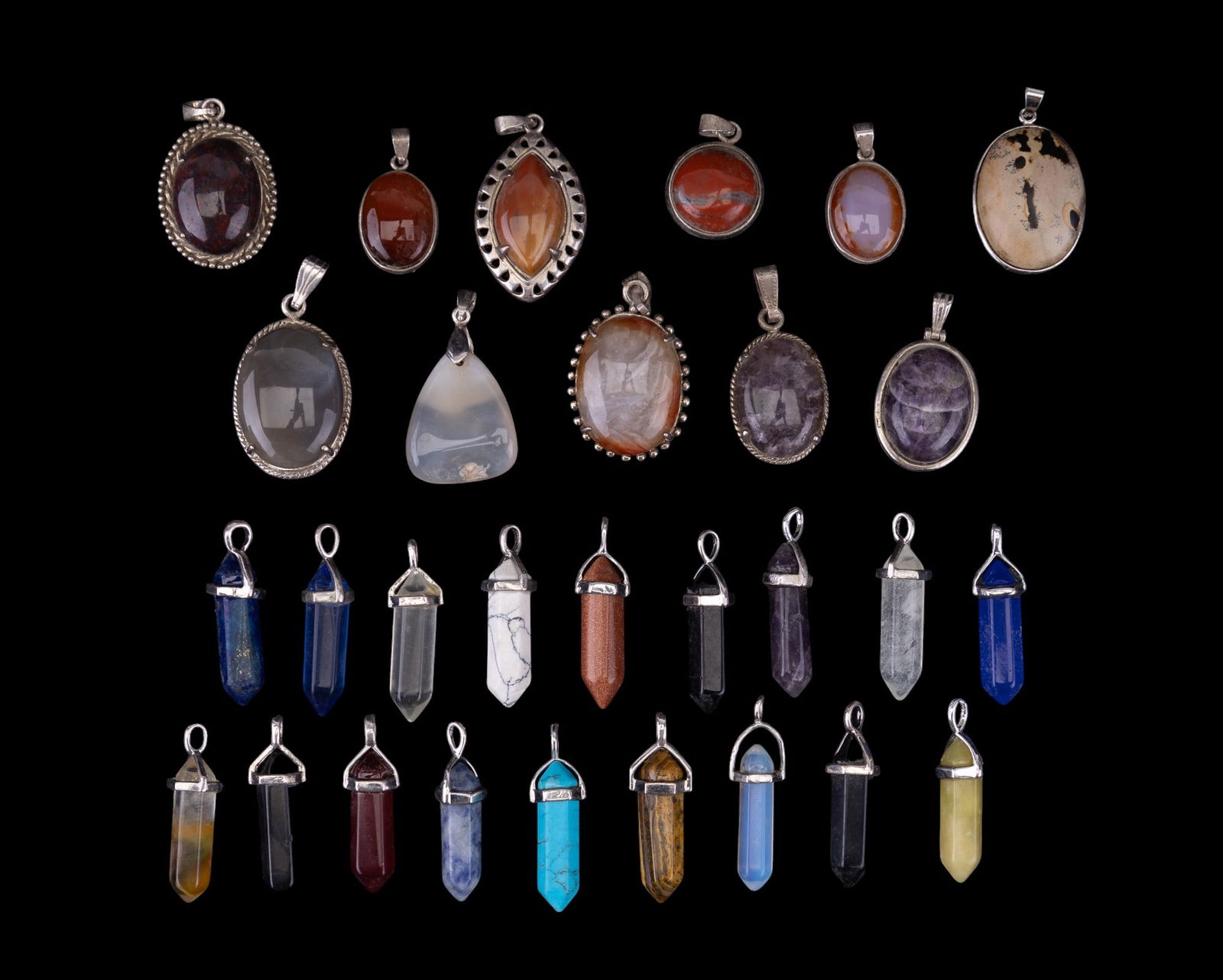 Semi Precious Stone Pendants (29): Total 29 stone pendants, some testing in the range of carnelian, lapis, labradorite, sodalite, tiger eye, amethyst and more. At least one finding marked 18K gold plated.