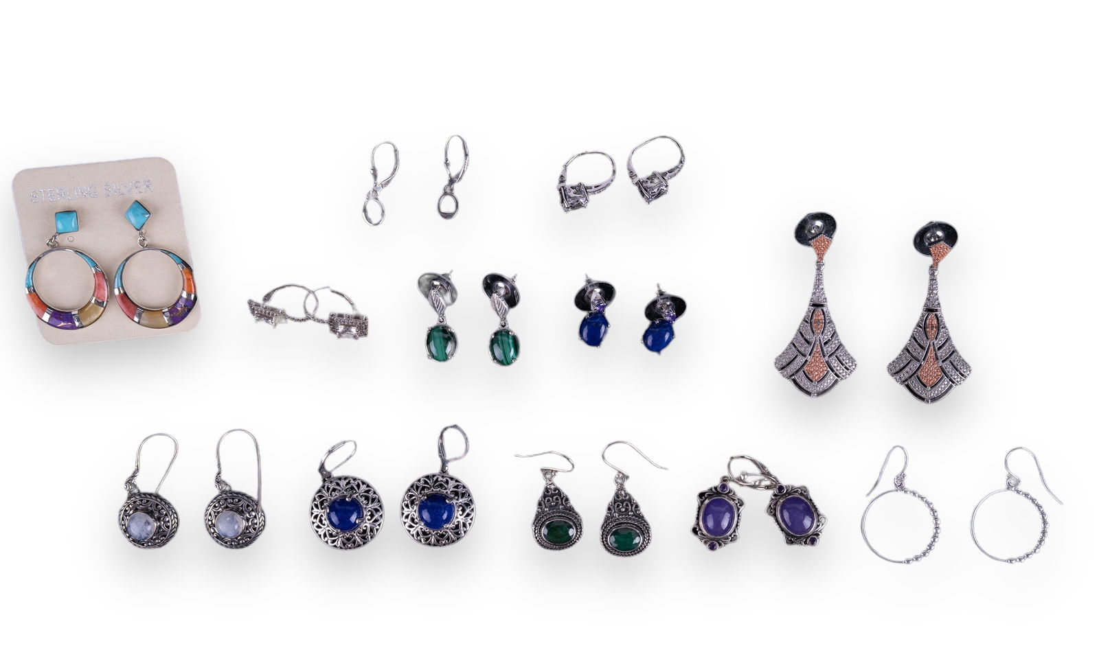 Sterling Silver & Semi Precious Earrings: 12 pairs of sterling silver and semi-precious earrings including stones that test in the rage of white sapphire, green sapphire, emerald, malachite, lapis, amethyst and CZ.