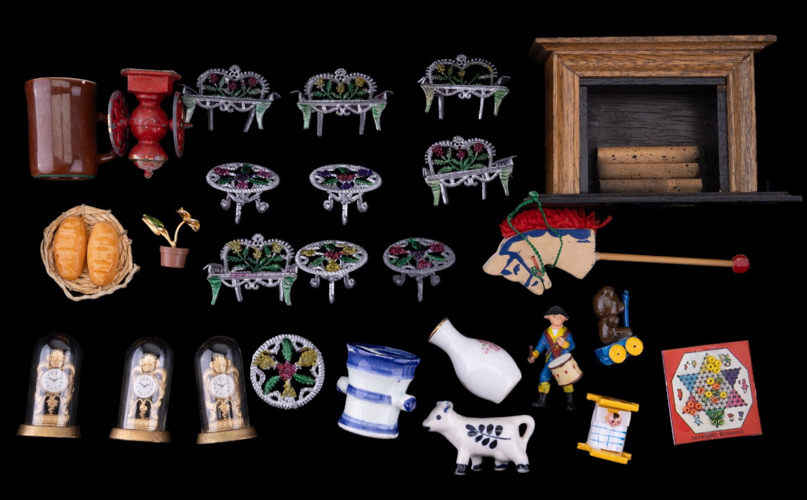 Assorted Dollhouse Accessories (24 pcs): Assorted dollhouse accessories including 10 pieces of metal patio furniture, a hand crafted fireplace, 3 dome clocks, wooden figurines, porcelain and stoneware pieces, and more. Dollhouse Miniatures.