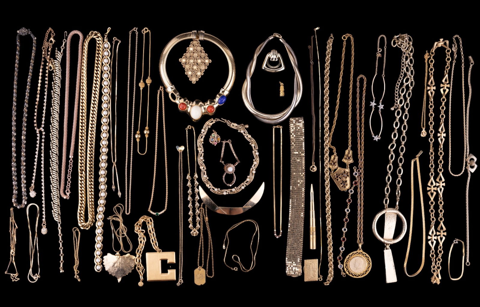 Vintage Gold tone Jewelry (44 pcs): Assorted vintage gold tone necklaces, chains and pendants with rhinestones, faux pearls, glass, mother of pearl, and more by Monet, Coro, Trifari, Gorjana, Roman, and Maxine Decker (missing a stone).