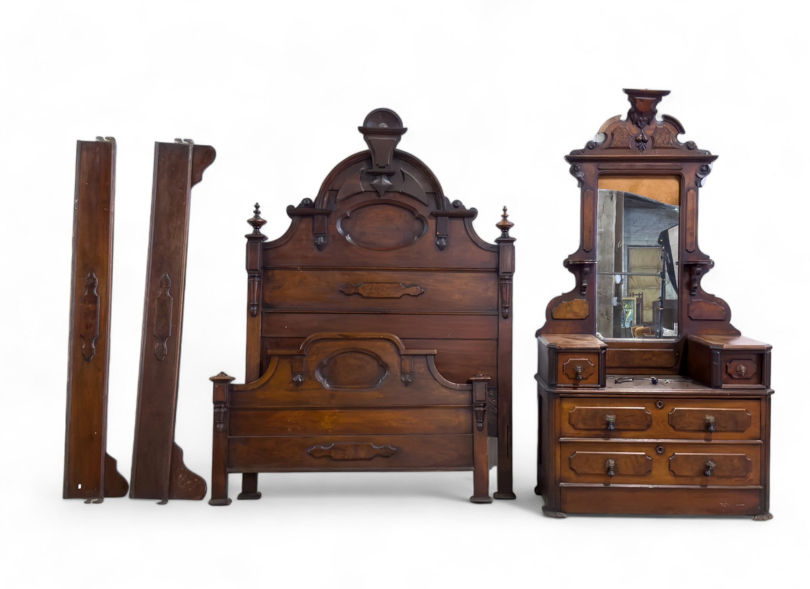 Victorian Furniture Bed and Mirrored Dresser: Victorian Furniture Bed and Mirrored Dresser, all constructed of walnut and both pieces of furniture has some molding loose and missing finial on the dresser measuring approx 85 x 44 x 19in. Bed is es