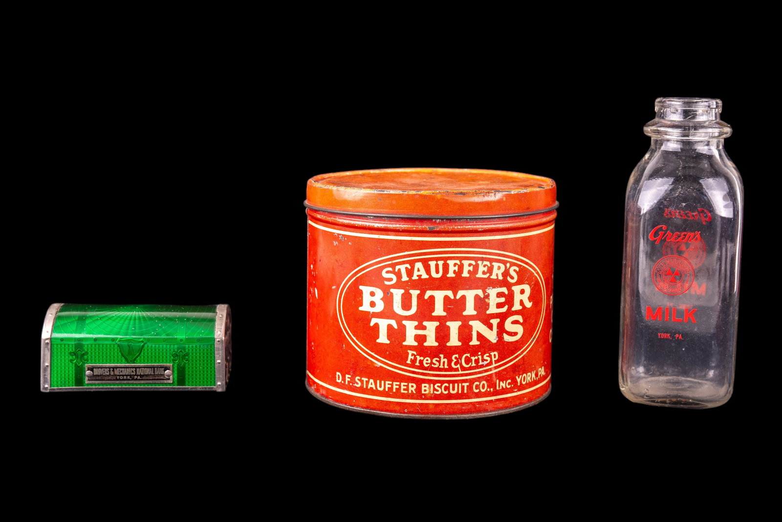 Vintage York Co PA Advertising Collectibles: Vintage York Co PA Advertising Collectibles. Includes Stauffer Biscuit Co tin, Green's Dairy bottle, & Drovers & Mechanics Nat'l Bank chest (no key).