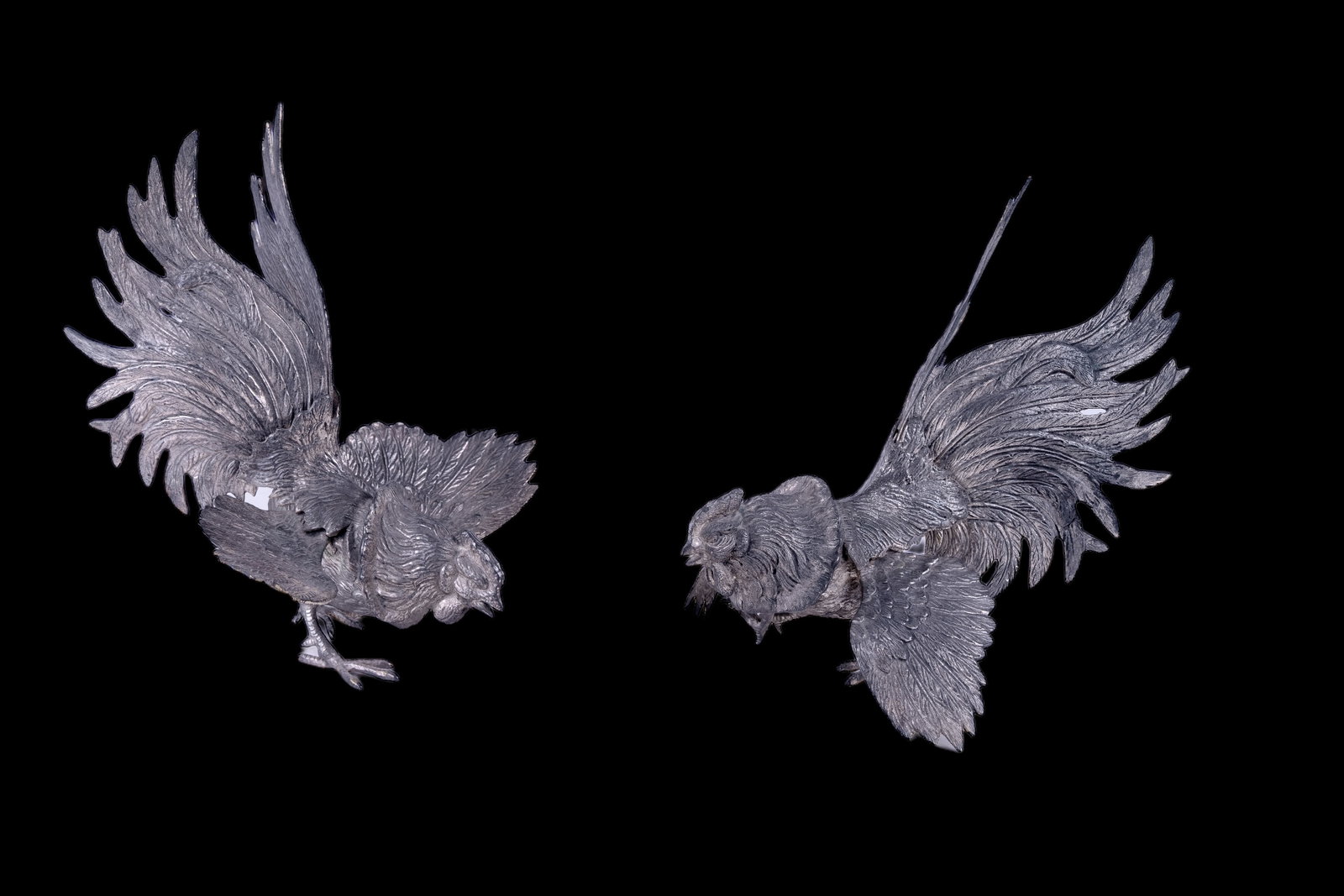 MCM Cast Metal Decorative Roosters: MCM Cast Metal Decorative Roosters, 11" long. One has slight bend on wing tip.