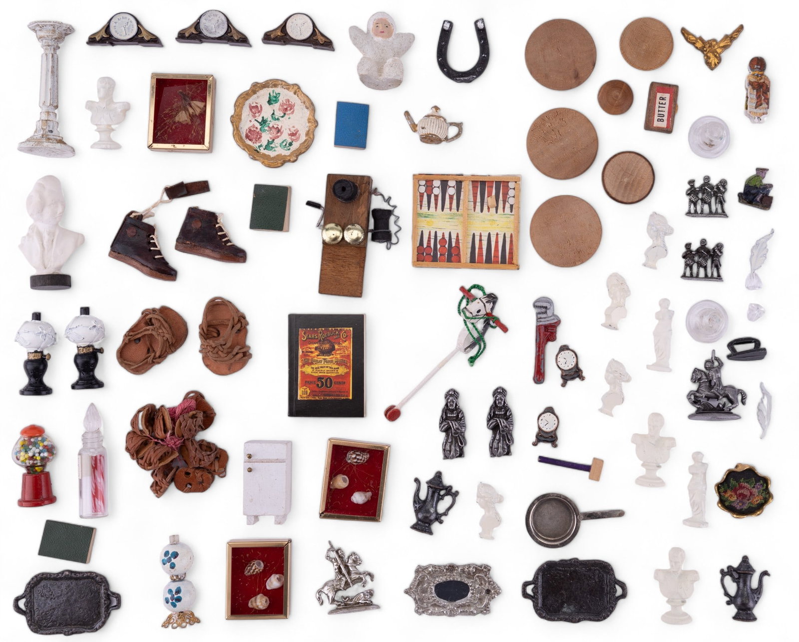 Doll House Accessories - Wooden, Cast, and Leather: Doll house accessories including cast metal statuary, leather shoes (as found), book, cast metal wrench, glass ink well, glass candy jar, needlepoint, and more. Dollhouse miniatures.