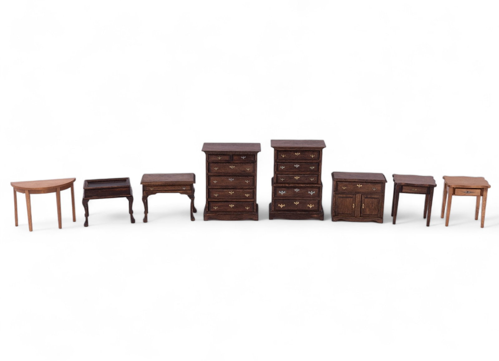 Antique Style Doll House Furniture: Antique style doll house furniture including 2 chest of drawers, wash stand, 2 one drawer stands, demi lune table, and others. Largest piece measuring approx. 4.325" H. Dollhouse miniatures.