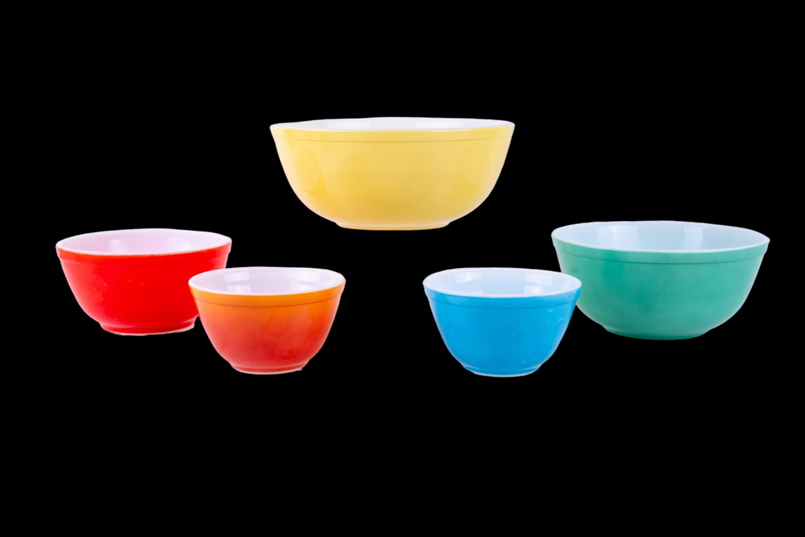 Vintage MCM Pyrex Nesting Bowl Set (5): Includes 5 Pyrex nesting bowls with largest bowl measuring approx. 10.5" Dia x 4.25" H. Good condition.