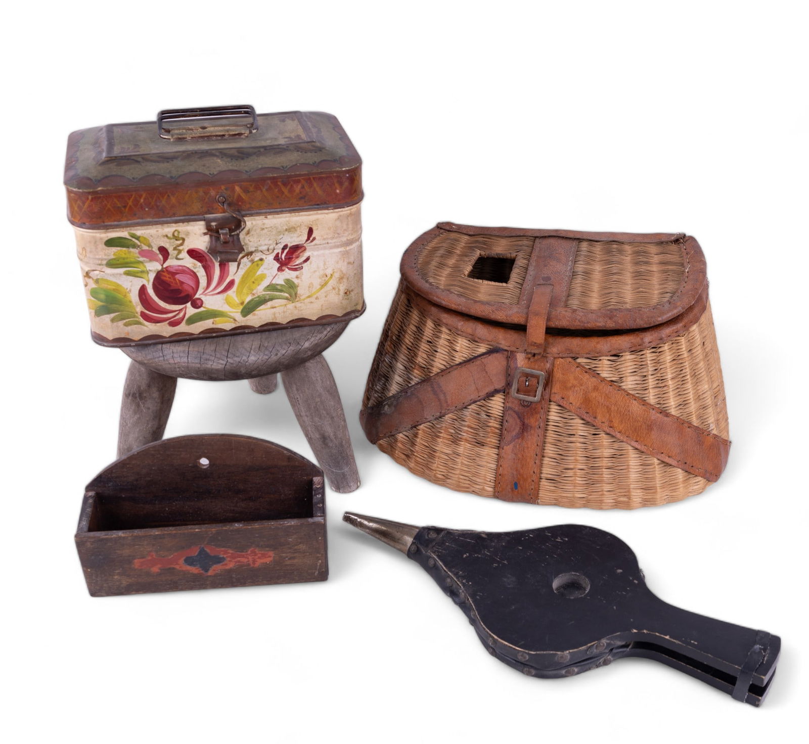 Antiques and Vintage: Tole painted antique lunch box measuring 9.5" W x 6.25" H x 6.5" D, vintage fireplace bellows, vintage whicker fishing creel (leather has some loss and discoloration), antique milking stool with maker