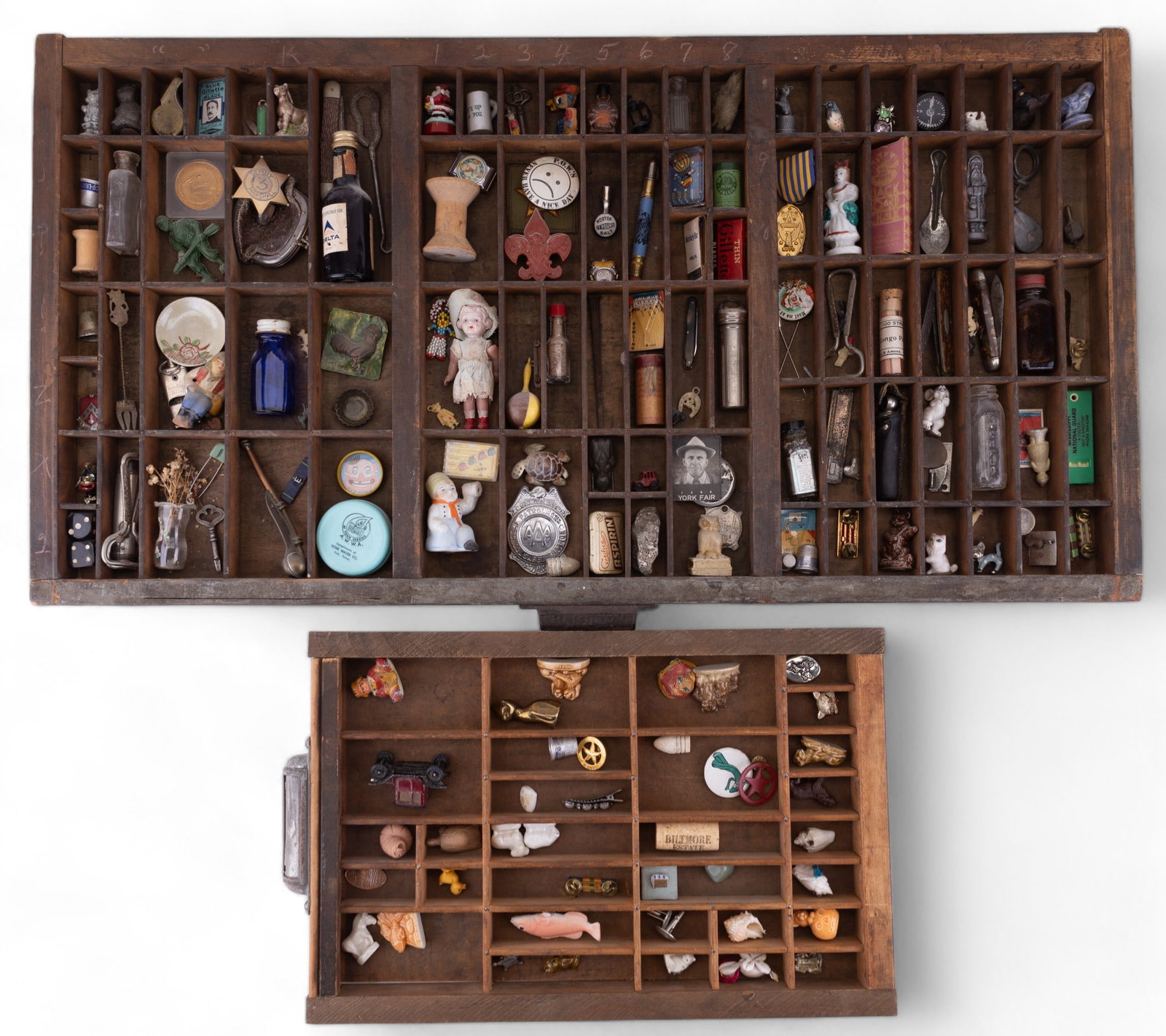 Vintage Printers' Type Drawers With Collectibles: Includes one vintage Hamilton California job case filled with assorted vintage ephemera, tools, figurines, and York, PA related items. Case measures approx 32.25" W x 1.75" H x 17.5" D and has hand wr