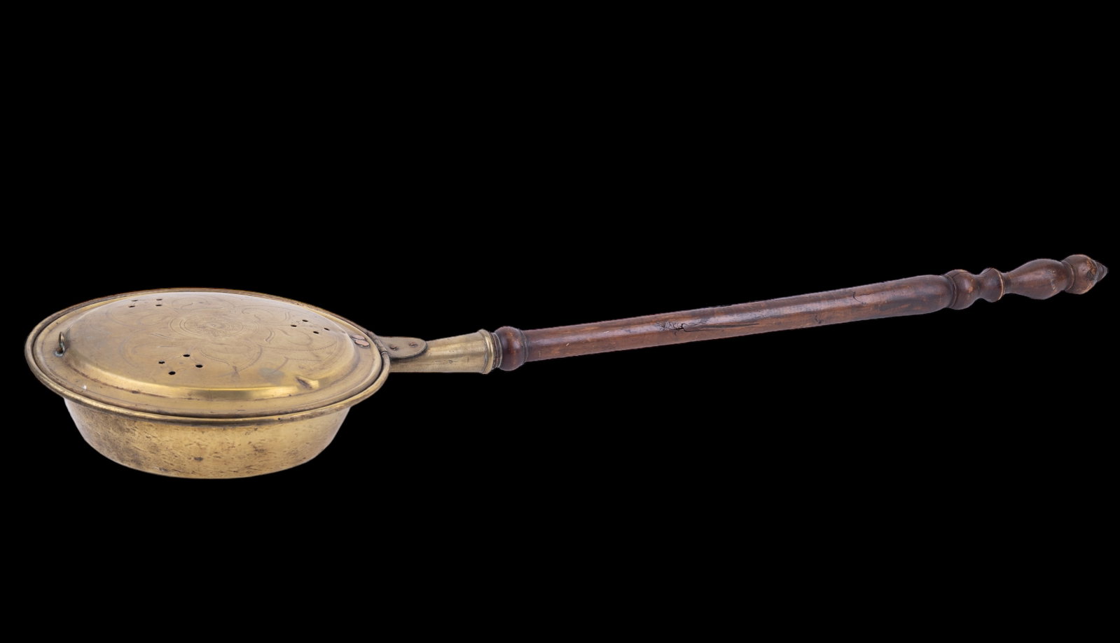 19th C Brass & Mahogany Bed Warmer: Bed warmer brass pan measures 12" in diameter with a 33" long handle. It has a light floral pattern on the lid and copper rivets.
