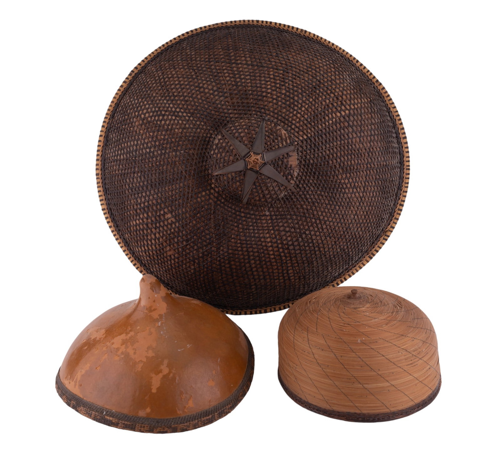 Reed & Gourd Native Filipino Hats: Three Native Filipino hats including one gourd and two reed. The largest measures approx 23.5" dia. The gourd hat has some loss on surface and largest has loss on top.