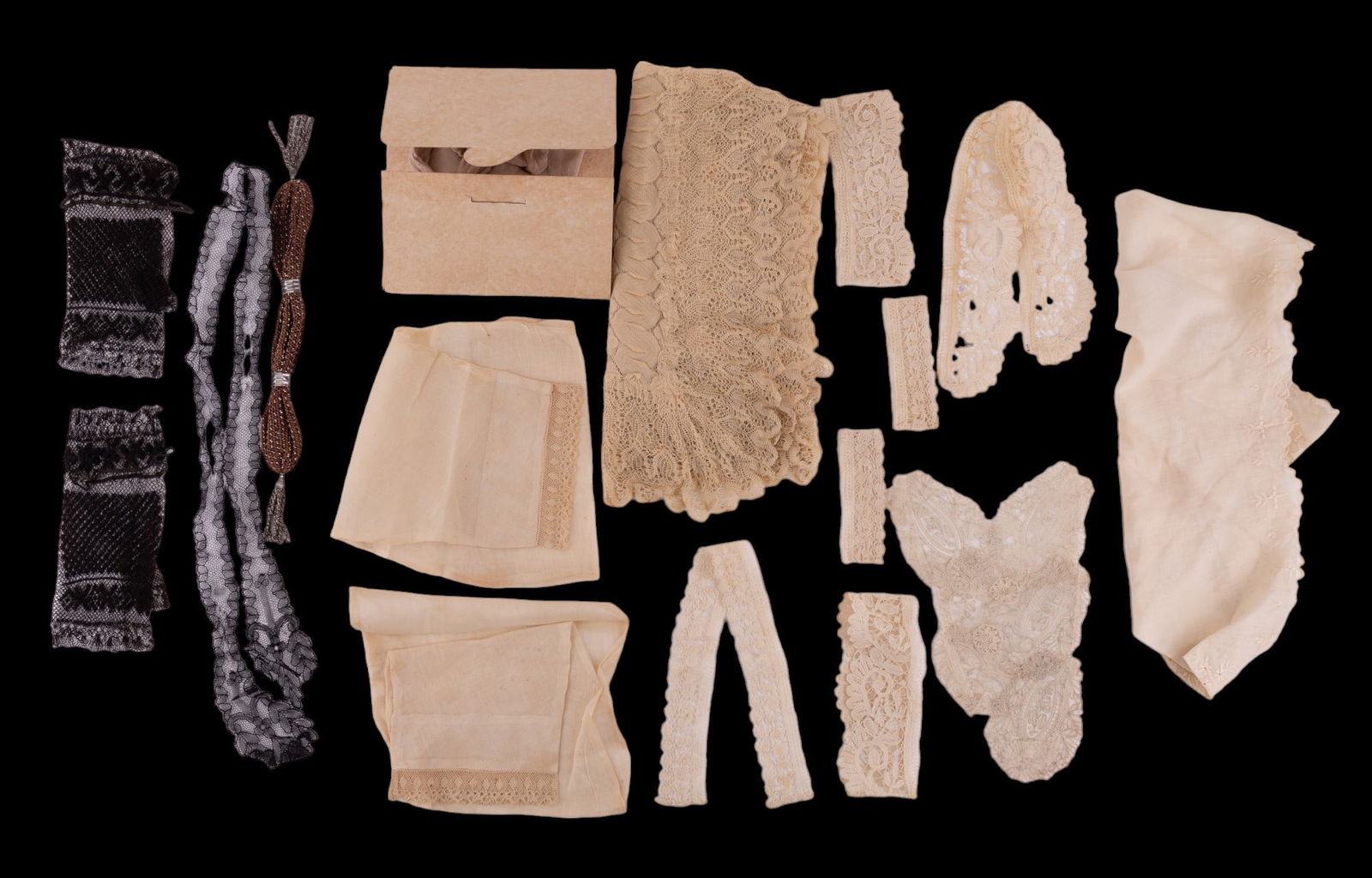 Antique Lace, Silk Stockings, Lace Gloves, More: Antique lace pieces, black lace finger gloves, brown accent piece, silk and linen hankies, 19th century silk stockings.