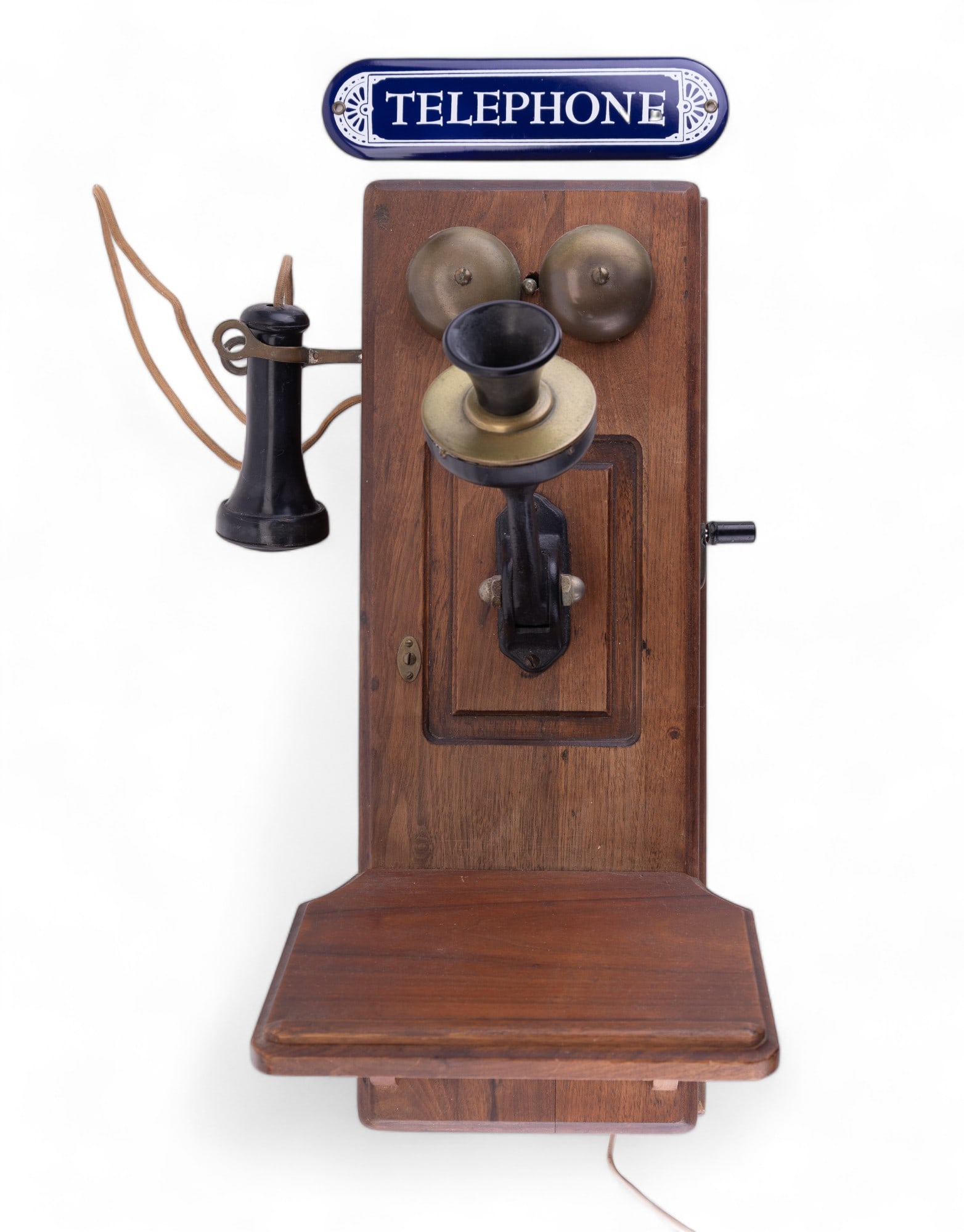 Antique Crank Phone Rotary Conversion With Sign: Antique crank phone with rotary conversion measuring approx. 21.5" H x 13" W x 12" D. "Patented Made in USA Case appears to be refinished. Also includes tin enamel "telephone" 10" W x 2.5" H