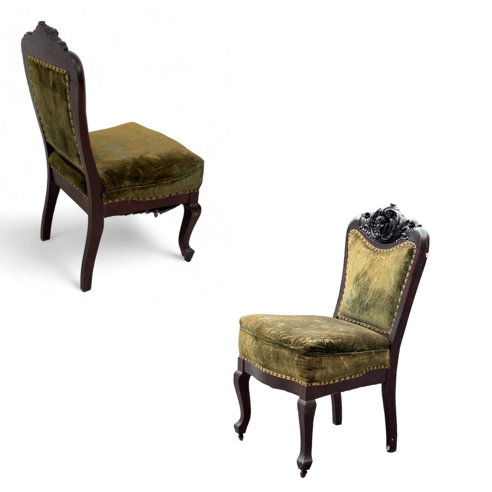 Victorian Carved Side Chairs Olive Upholstery: Victorian side chair with decoratively carved putti and sea scrolls at top center. Upholstery is intact. Measures approx. 39" high, 20" x 21".