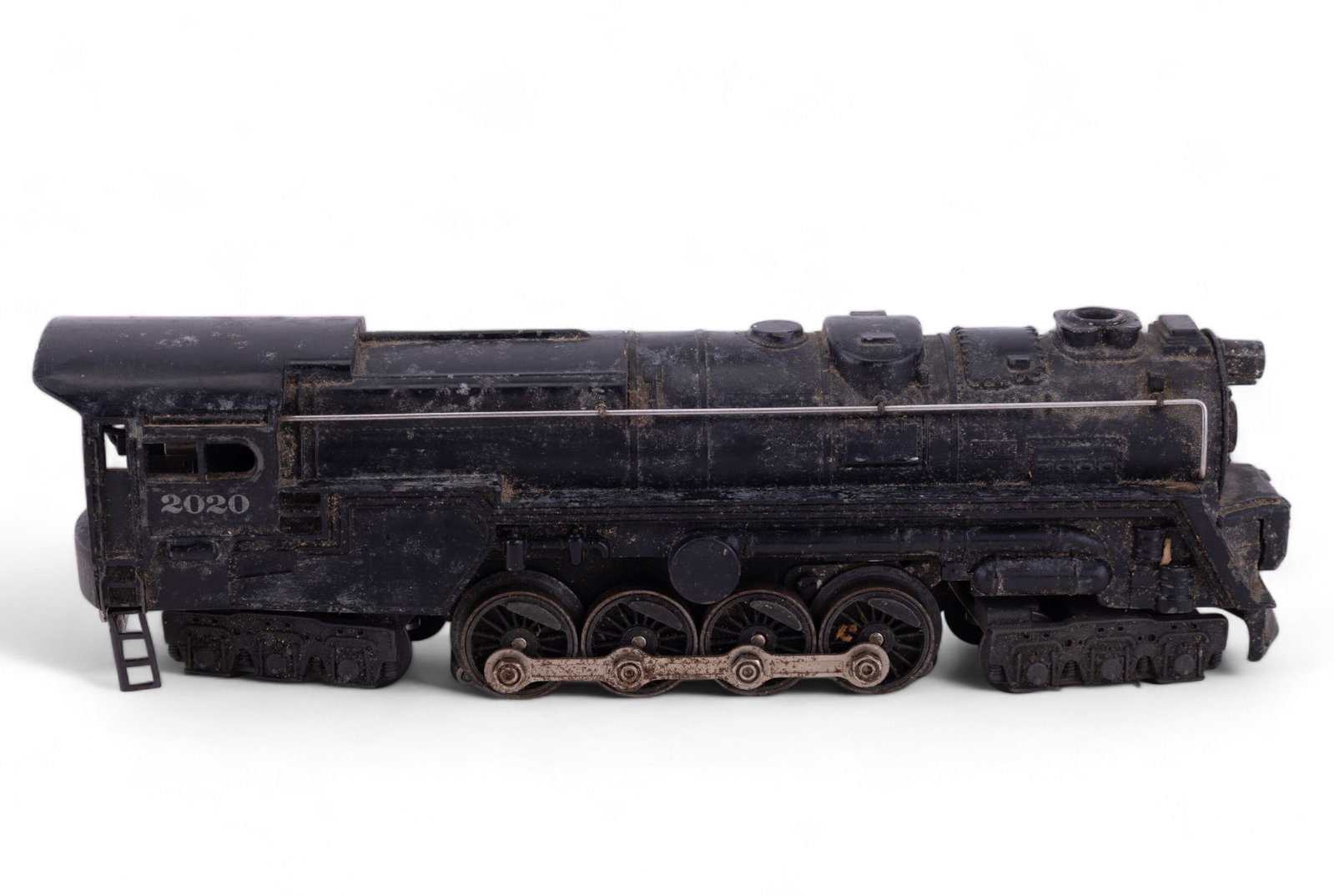 Lionel Train Locomotive #2020: Post war Lionel Locomotive #2020. Condition: Untested, has oxidation, bend on ladder, paint loss on front stack. No box is included. Untested.