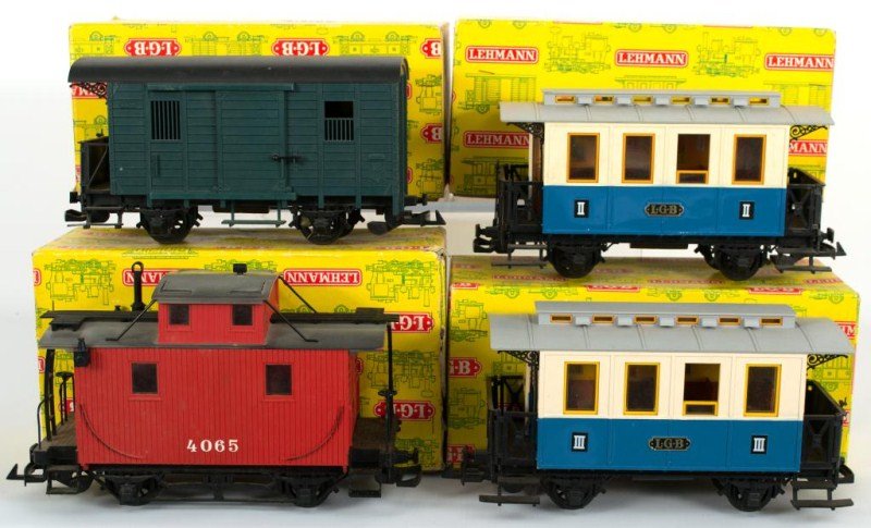 Four Early LGB Cars 4065, two 3012, and 3019: Four Early LGB cars including LGB 4065, two LGB 3012, and a LGB 3019, all in original yellow boxes