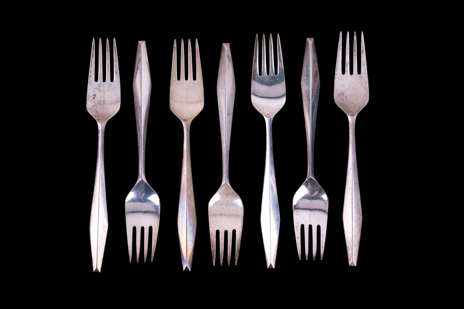 Reed and Barton Sterling Silver Flatware: 7 sterling silver salad forks with total of weight of 334 grams.