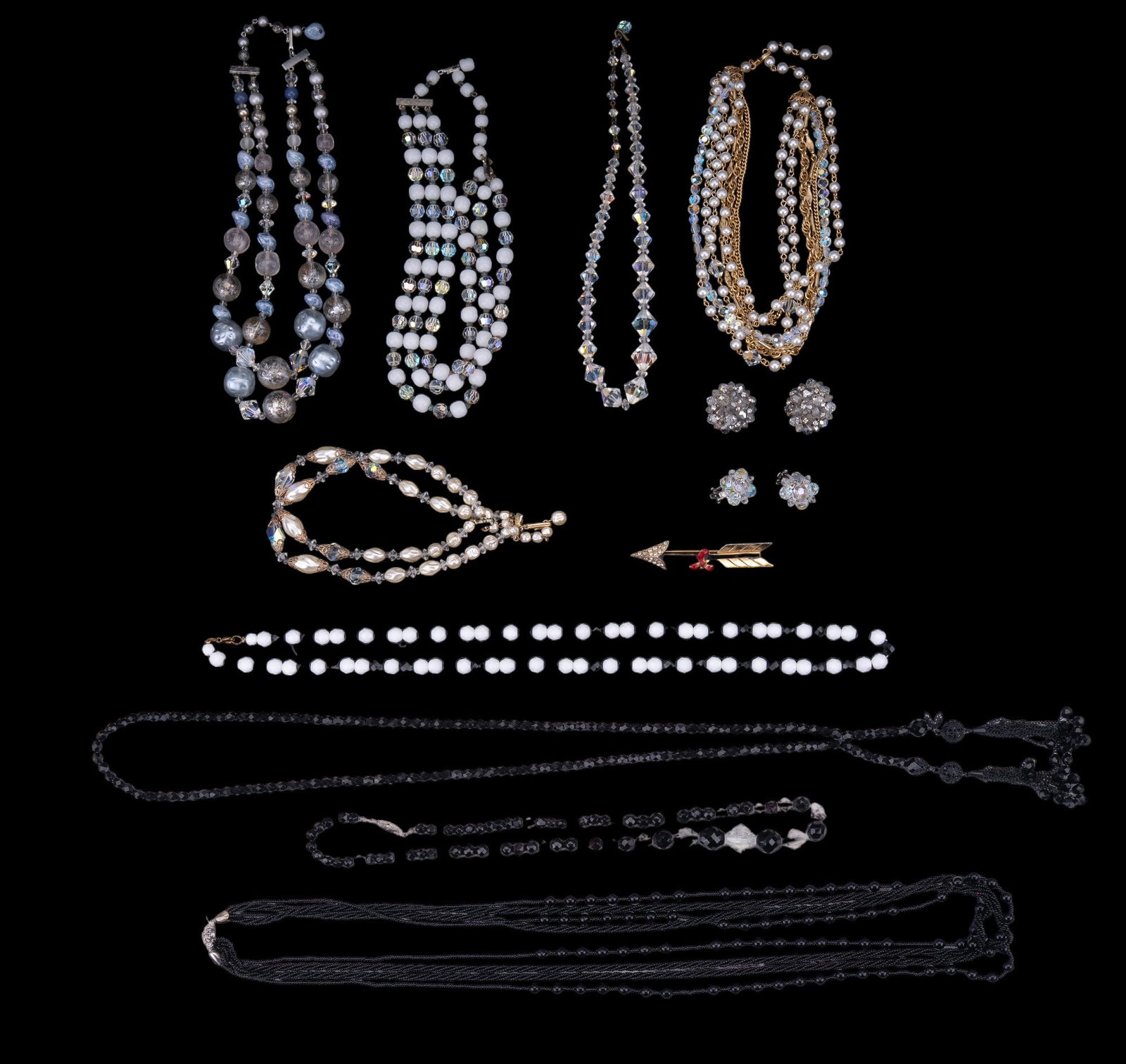 Vintage Estate Jewelry: Various vintage crystal, jet, and pearl style jewelry including necklaces, earrings, and brooch.