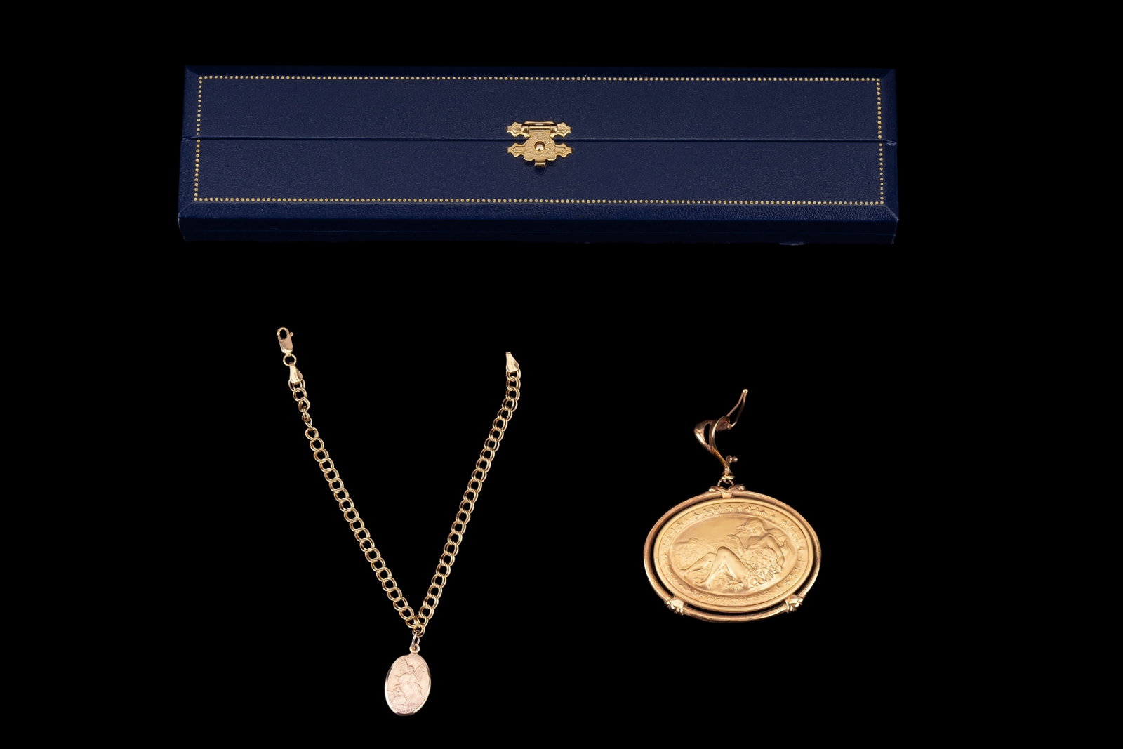 14K Gold Jewelry: 14K gold pendant weighing approx. 13.5g and 14K gold bracelet (with original box) with 10K pendant weighing approx. 5g.