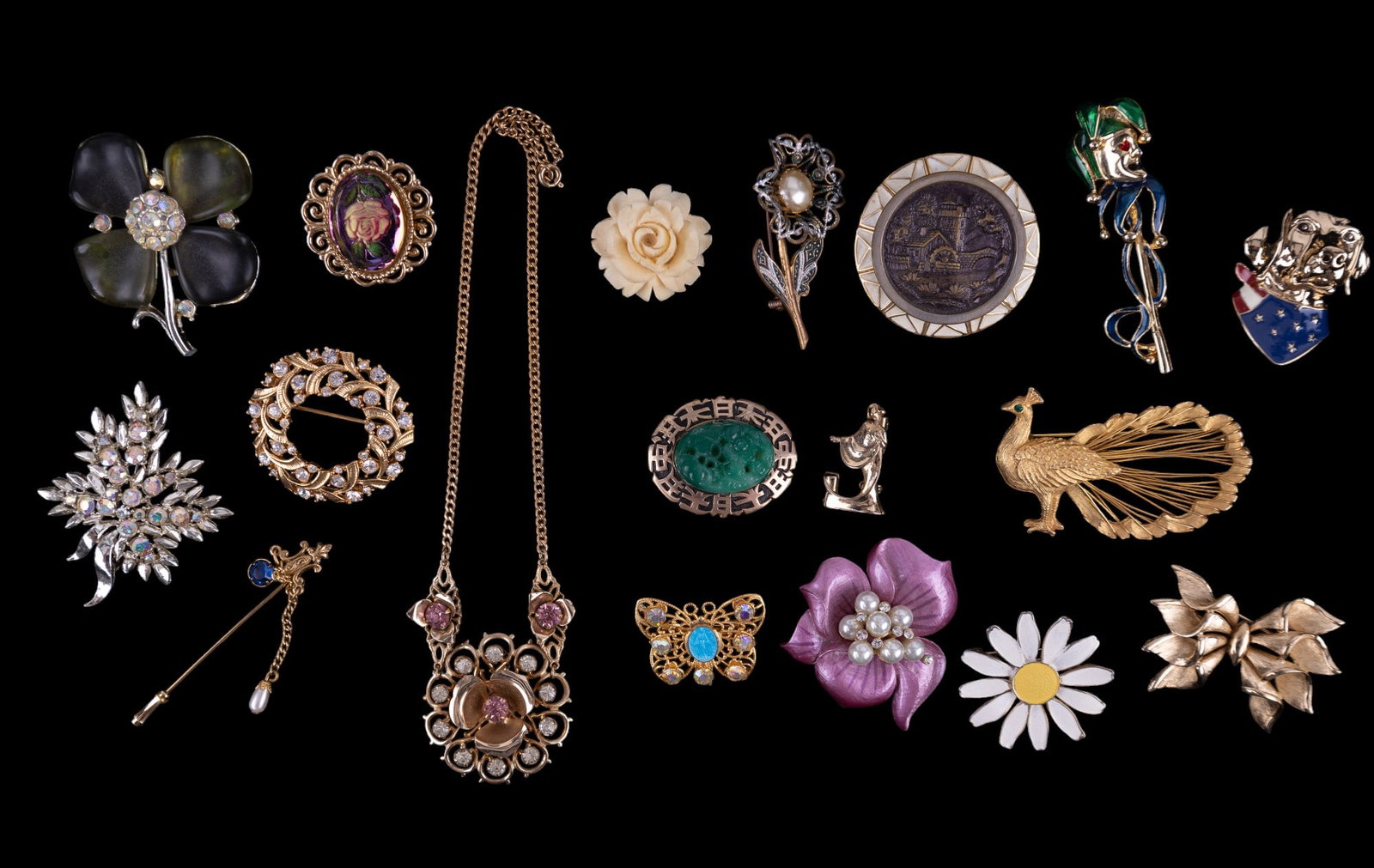 Figural Brooches & Necklace: Brooches (16), Stick pin, & Necklace. Some signed Dodds and FranGous. Subjects include floral, peacock, patriotic pooch, jester, and more.