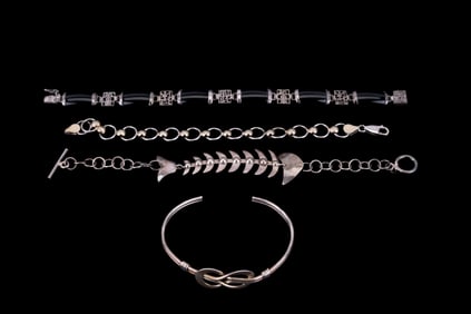 Four Sterling Silver Bracelets