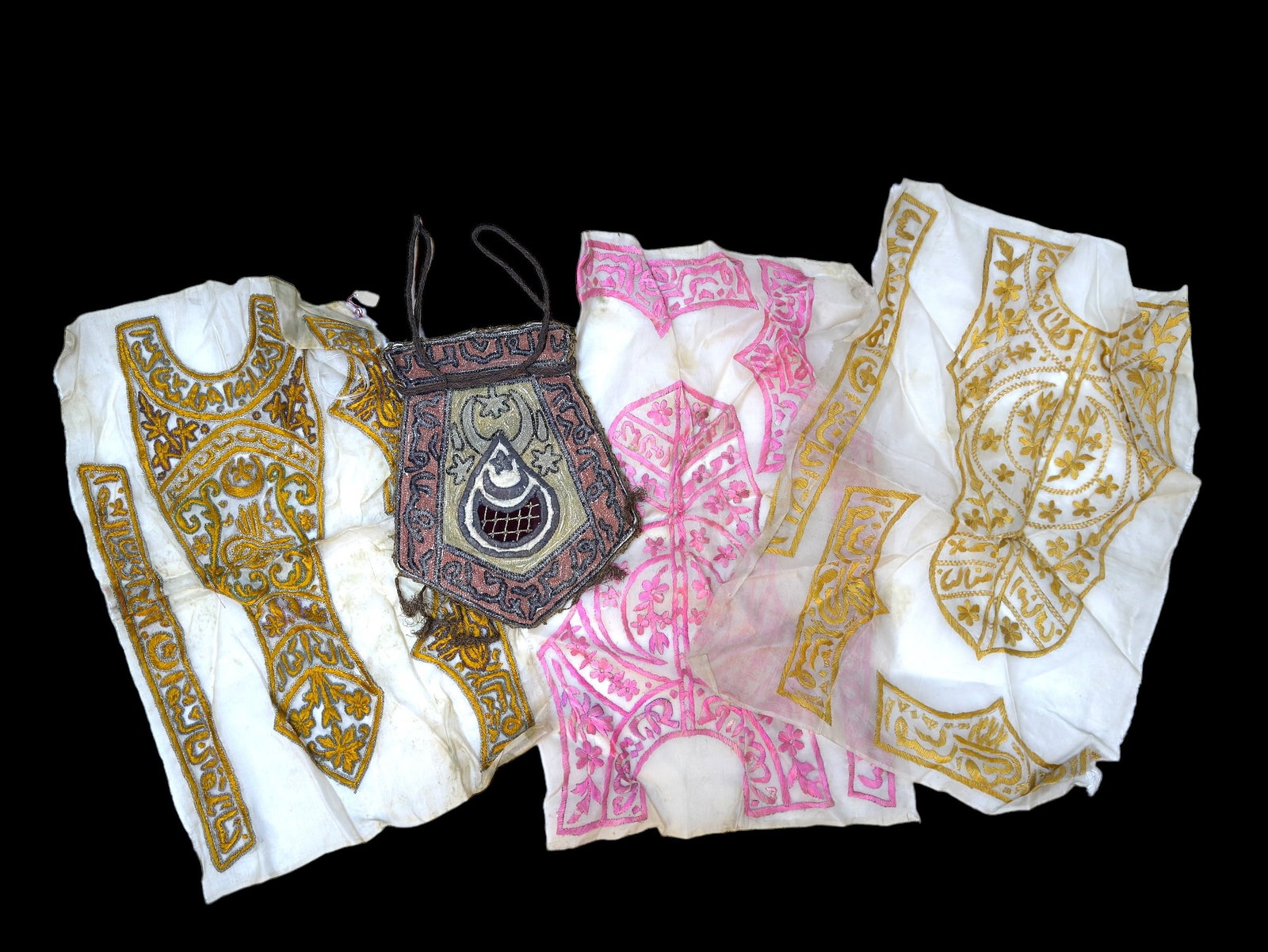 Antique/Semi-Antique Turkish Textiles (4): Textiles are in shades of yellow and pink with fine needlework embroidery. One piece is a satchel bag with pull string decorated on each side. Largest piece measures 13" x 19". Pieces have holes and s