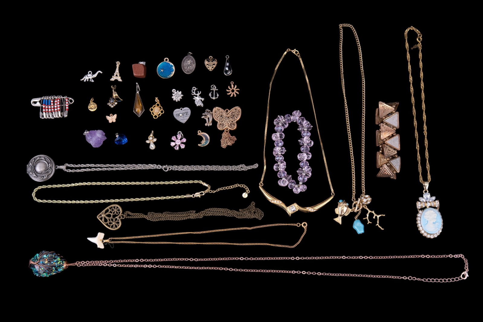 Costume Cameo Necklace, Pendants & Costume Jewelry: Gold tone Costume Cameo pendant necklace great condition as seen in photography, surrounded by untested stones. Many pendants including Eiffel tower, chunk purple stone pendant that tests for amethyst
