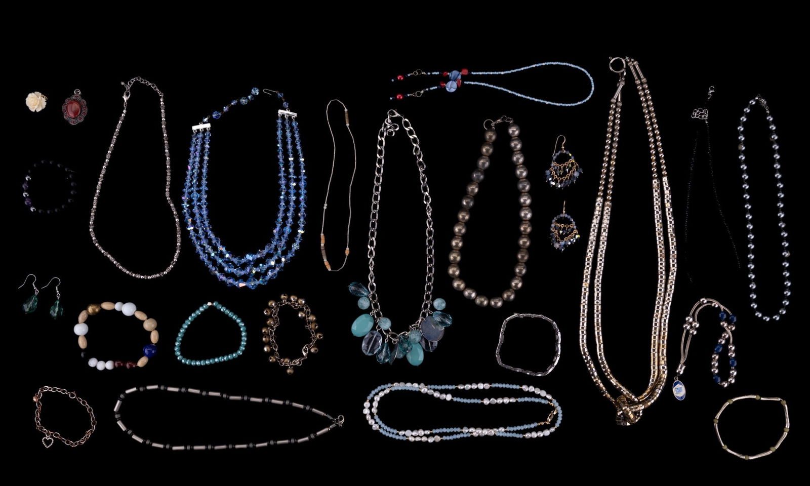 Pearl & Crystal Beaded Neck., Bead Jewelry & More: Tray grouping including a blue crystal freshwater pearl necklace, more crystal jewelry, a Greece souvenir bracelet, a large silvertone necklace w/ beads, stone and glass beaded bracelets, other beaded