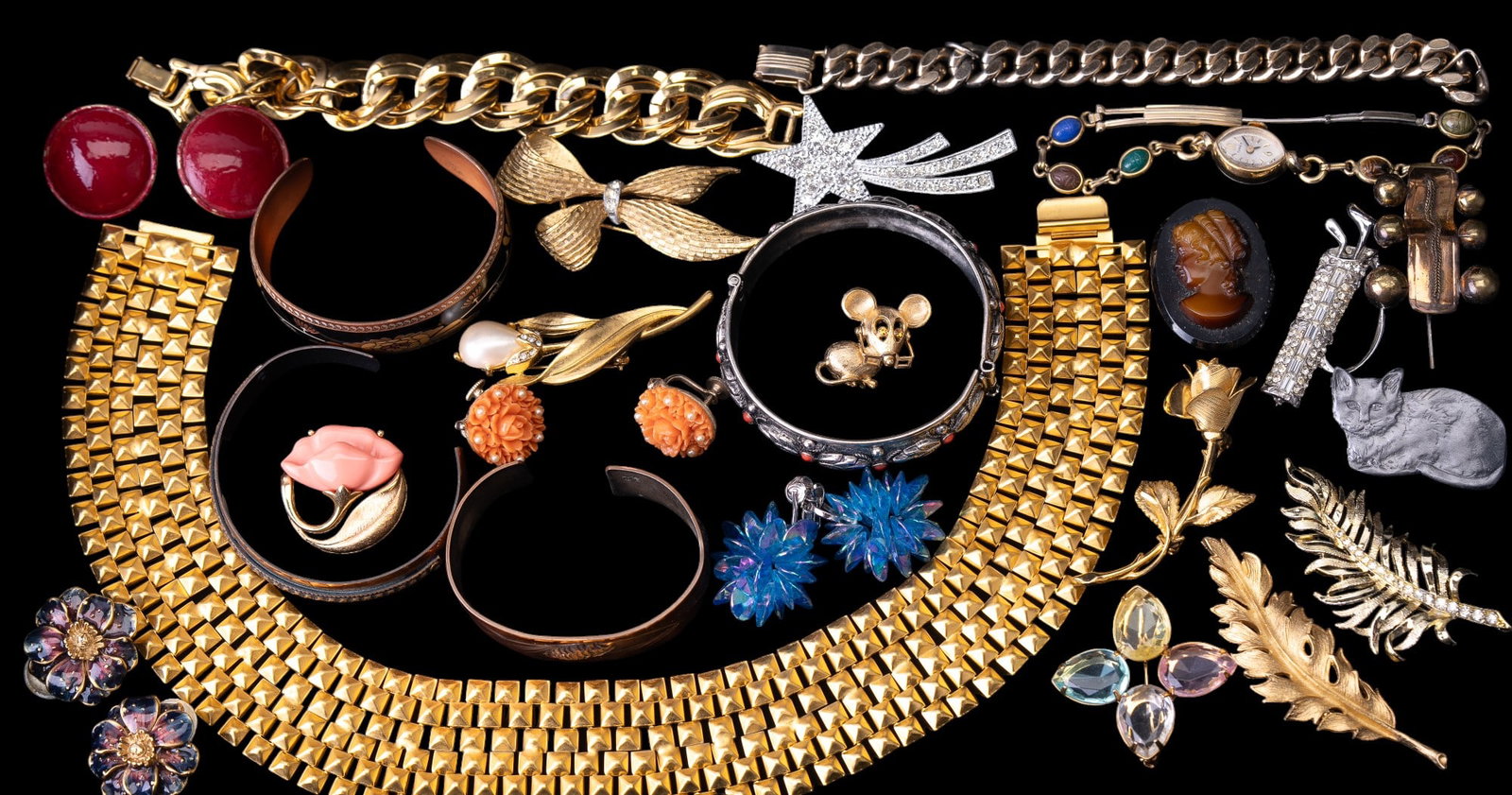 Coro Necklace & Vintage Jewelry: Grouping consists of a Coro signed earrings, a "Bijoux Vanwyk" wide goldtone spike necklace, Erwin clip earrings, copper bracelets, brooches and more.