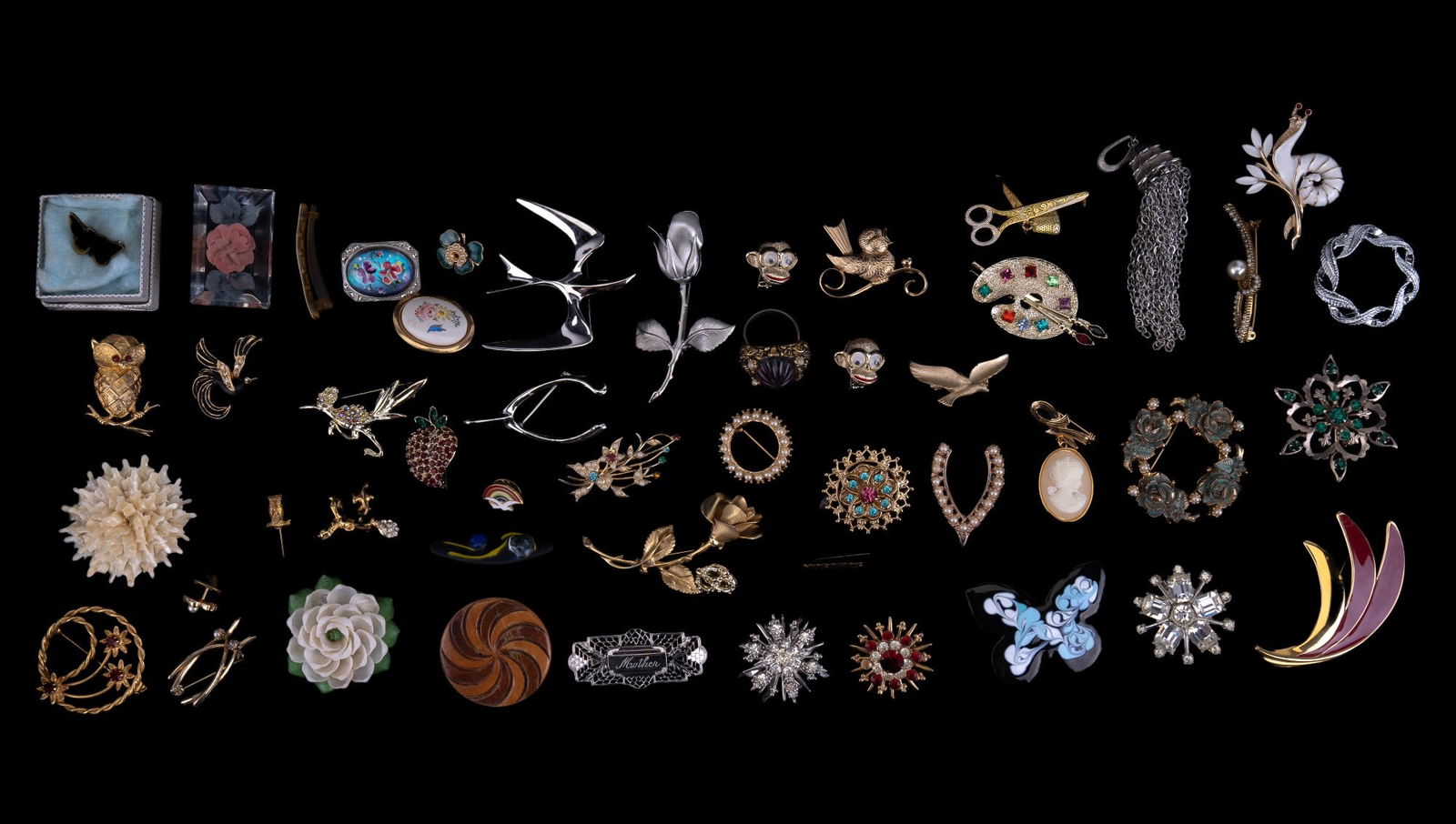Trifari & Estate Brooches: Vintage brooches, including Trifari enamel snail and more.