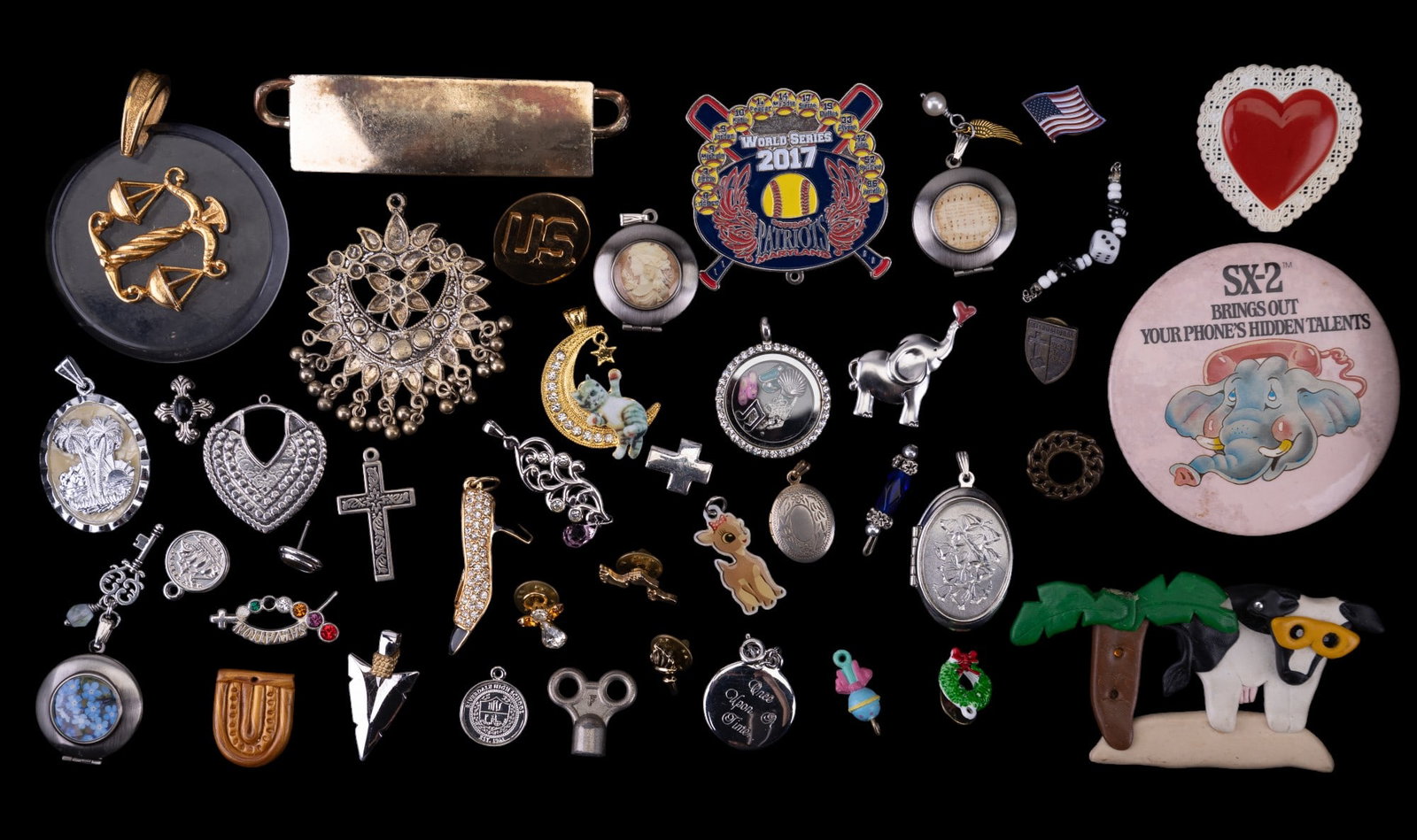 U.S. & Other Themed Pins, Pendants & Brooches: Lot includes U.S. pin along with many animal themed pins pendants and brooches. Includes high heel pendant marked Swarovski, scales of justice pendant, metro pins Maryland world series, cross and ston
