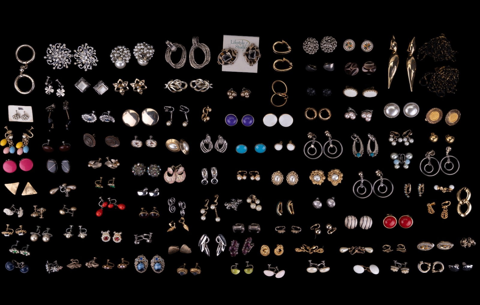 Two Trays of Clip On Costume Earrings: Lot includes Monet, Avon, Lifestyle Studio, SAC, Richelieu, and many unmarked vintage pieces.