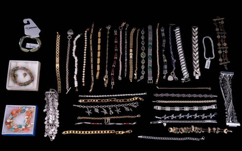 Two Trays of Costume Jewelry Bracelets (40 Total): Lot includes a New Direction bracelet & earring set and another set of green stone in box, plus bracelets by Monet, Avon, Belk in box, and many unmarked vintage pieces. One bracelet is marked 14K Stai