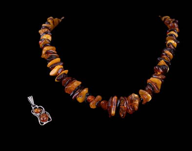Amber Necklace, Sterling & Amber Pendant: An amber necklace with .925 closure, and a sterling silver pendant with two pieces of amber set in.
