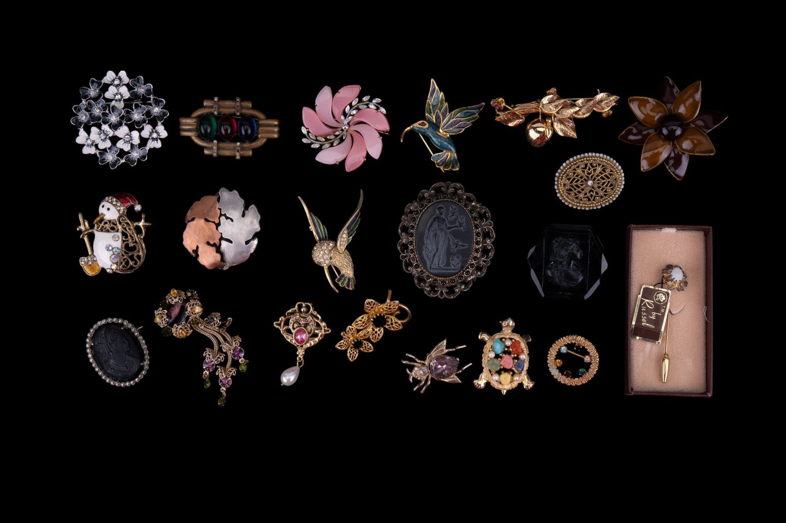 Napier, Coro & other Brooches: Grouping of figural floral & more brooches with standouts including: Sarah Coventry turtle pin w/ stones, Anson circle brooch with multi colored stones, white stone stick pin, Napier black/white flowe