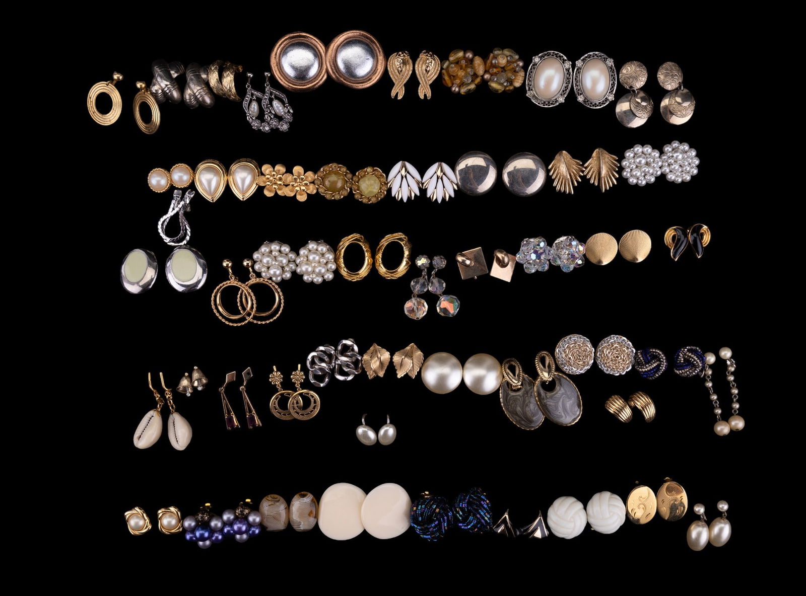 Vintage Clip/Screw-Back Earrings: 49 pairs of vintage clip and screw-back earrings featuring Trifari, Marvella, Giovanni, Richelieu, Monet, Star, Sperry, Avon, Japan, Hong Kong, Star, and more.