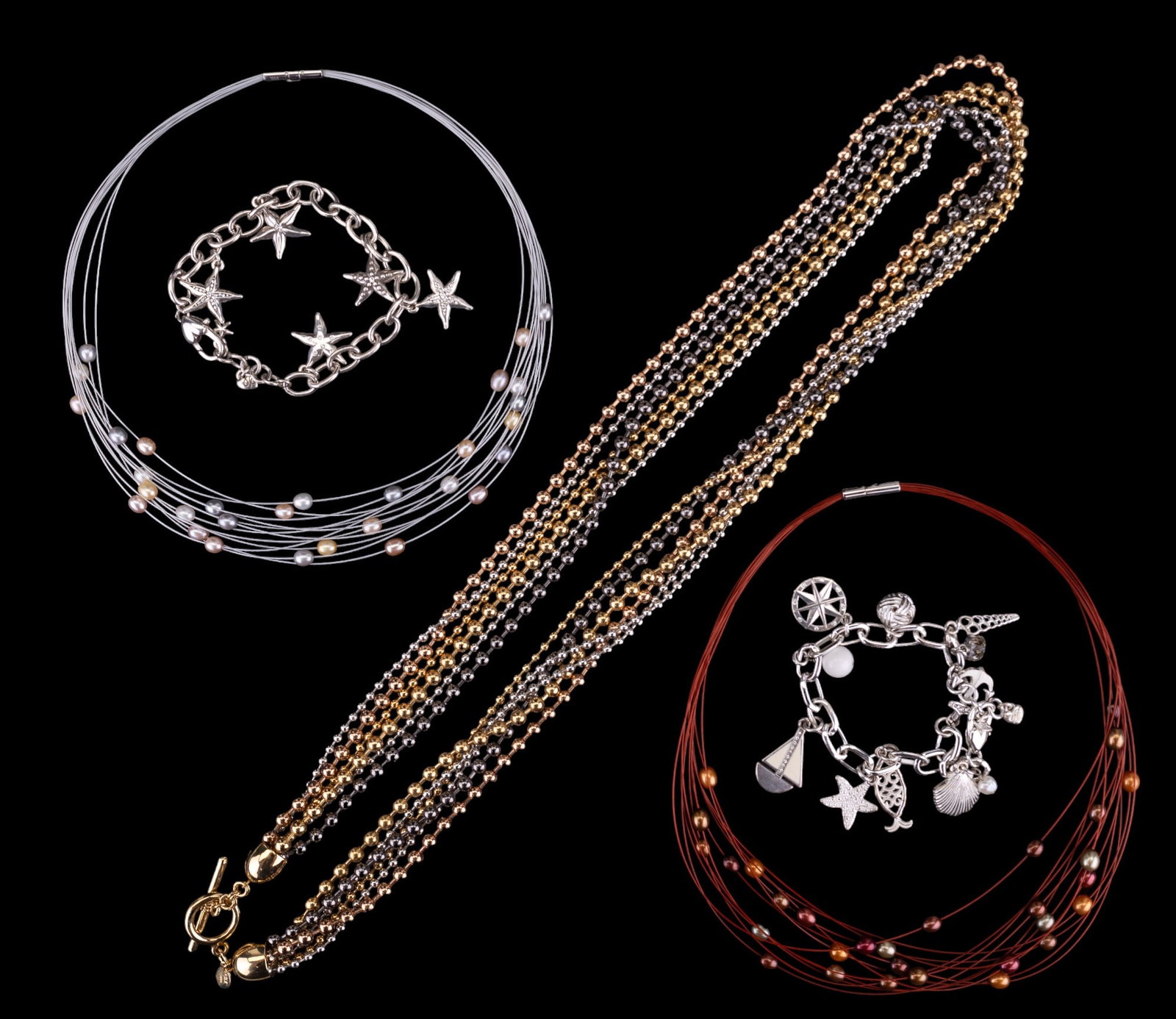 Honora, KJL, and Designer Jewelry: Honora multi hue pearl necklace, KJL long tri-color multi-strand necklace and Brighton pair of charm bracelets.