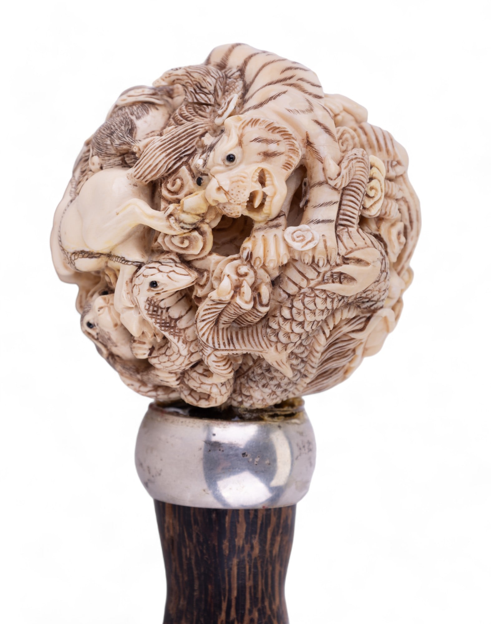 Natural Material Carved Zodiac Animal Puzzle Ball: Antique Japanese/Chinese natural material carved puzzle ball depicting the 12 zodiac animals. Puzzle ball is mounted on a twisted wooden cane. Cane w/ ball measures approx 37" tall. Carving is approx
