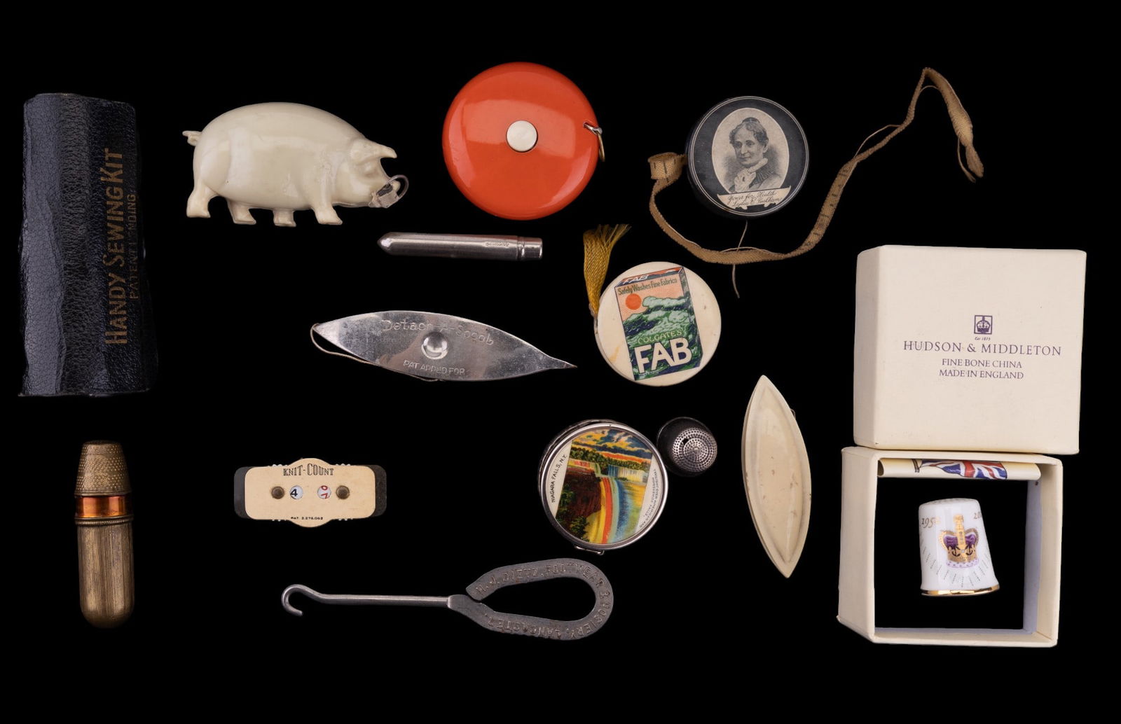 Sterling + Celluloid Sewing Accessories: Antique/Vintage group of sewing accessories with Sterling silver thimble, 5 celluloid tape measures, celluloid knit counter, 2 shuttles (one is celluloid), 2 sewing kits w/ needle case that has button